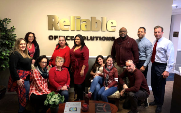 A photo of the Reliable Office team